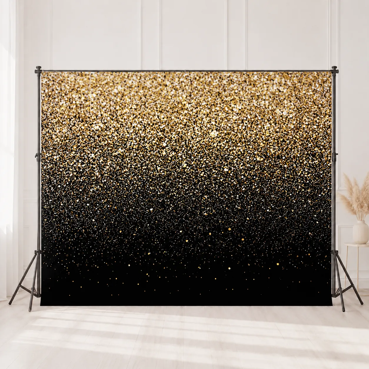 Fotobox-Hintergrund in Gold und Schwarz.